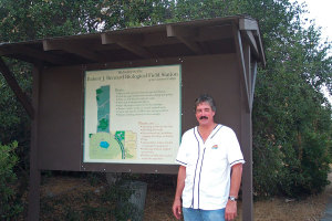 BFS Director Gene Fowler with the first version of the entry sign, September 2001. Nancy Hamlett.