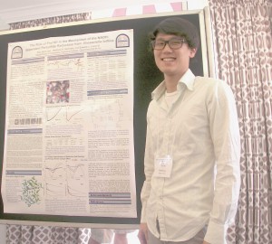 Kelvin with his poster at the Enzyme Mechanisms Conference, Jan 2011