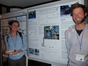 Nell and Derek presenting their poster